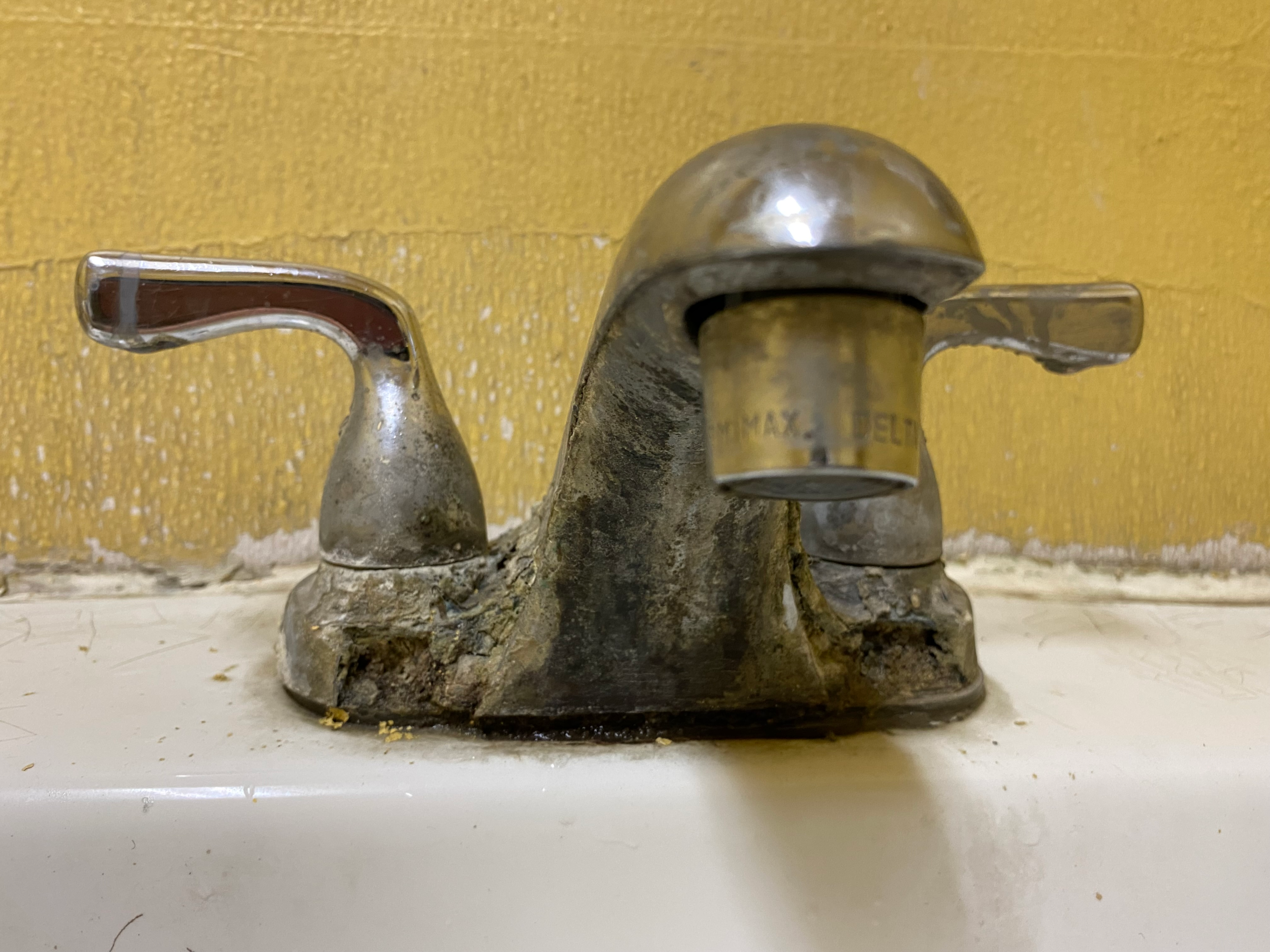 A faucet in Ramona is badly corroded due to hard water and leaks,