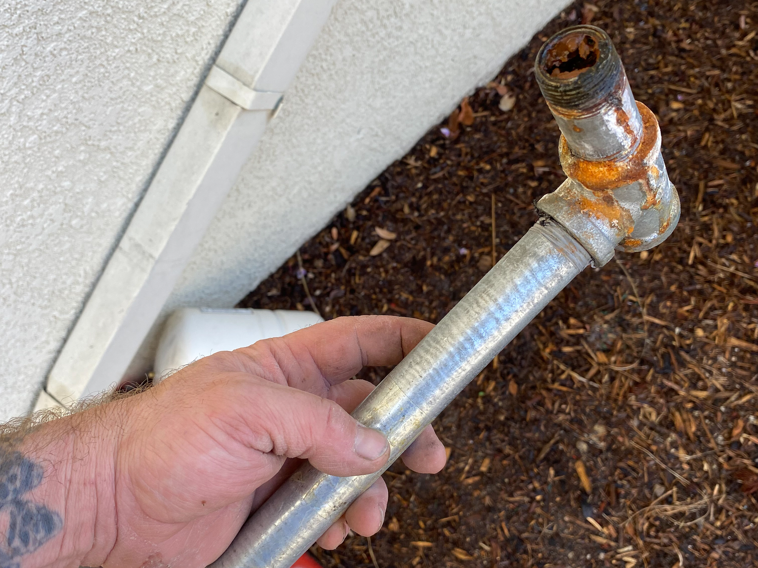 julian-ca-galvanized-pipes A corroded galvanized water pipe is removed from a Julian, CA home.