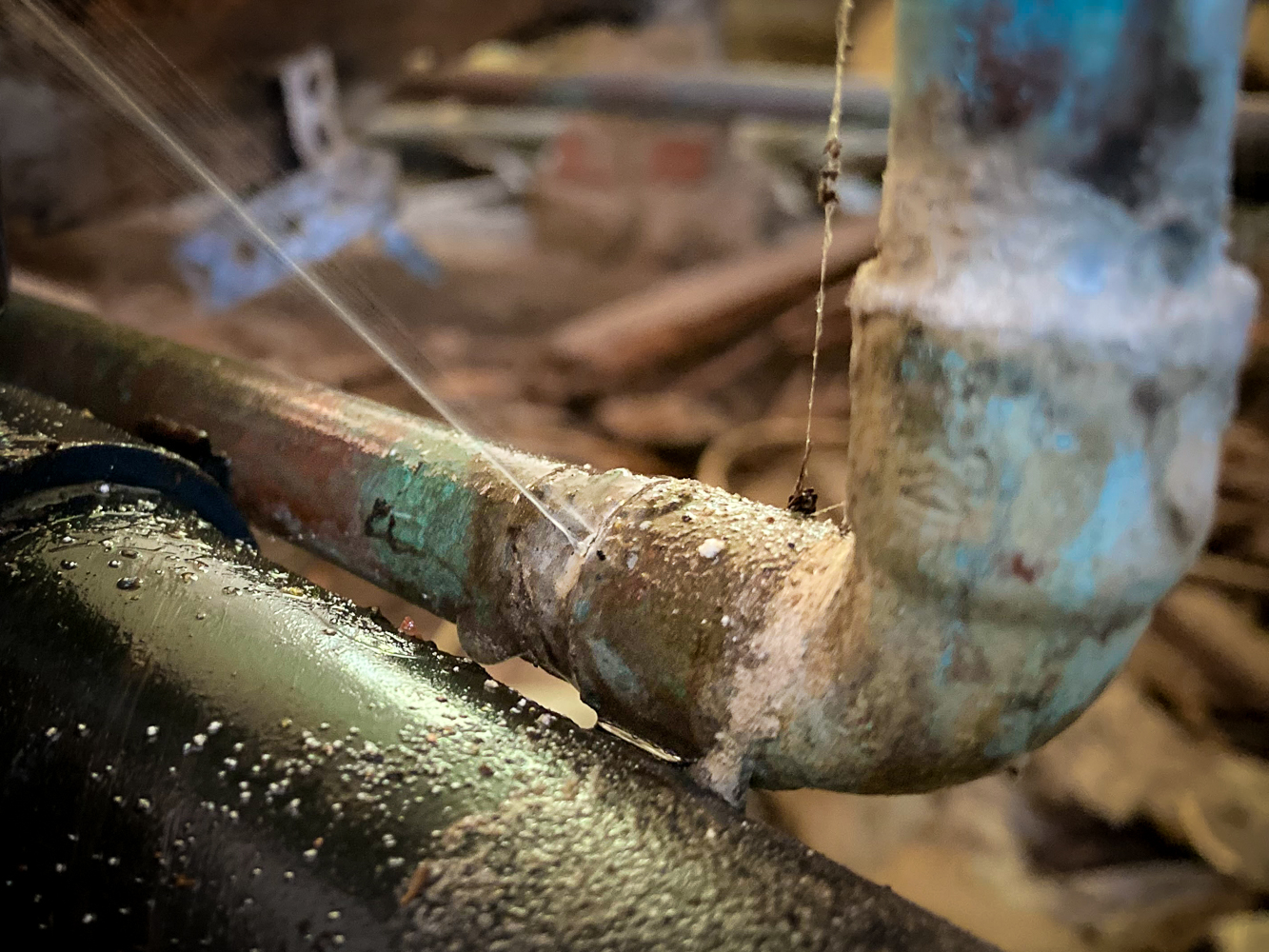 little-guy-plumbing-water-leak-detection A copper pipe is leaking due to pinhole leaks and corrosion.