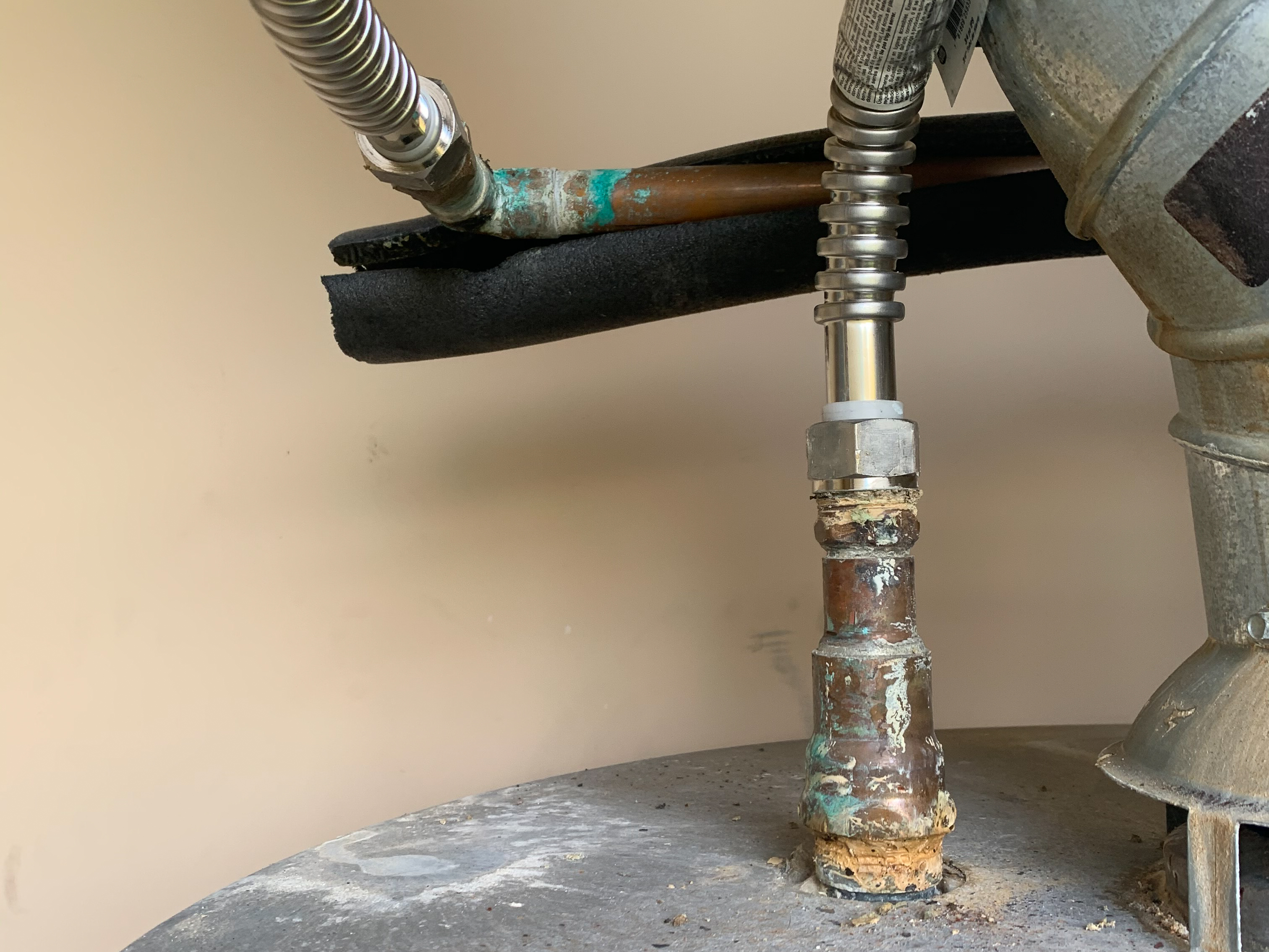A water heater in Ramona needs repair as a result of prolonged exposure to hard water.