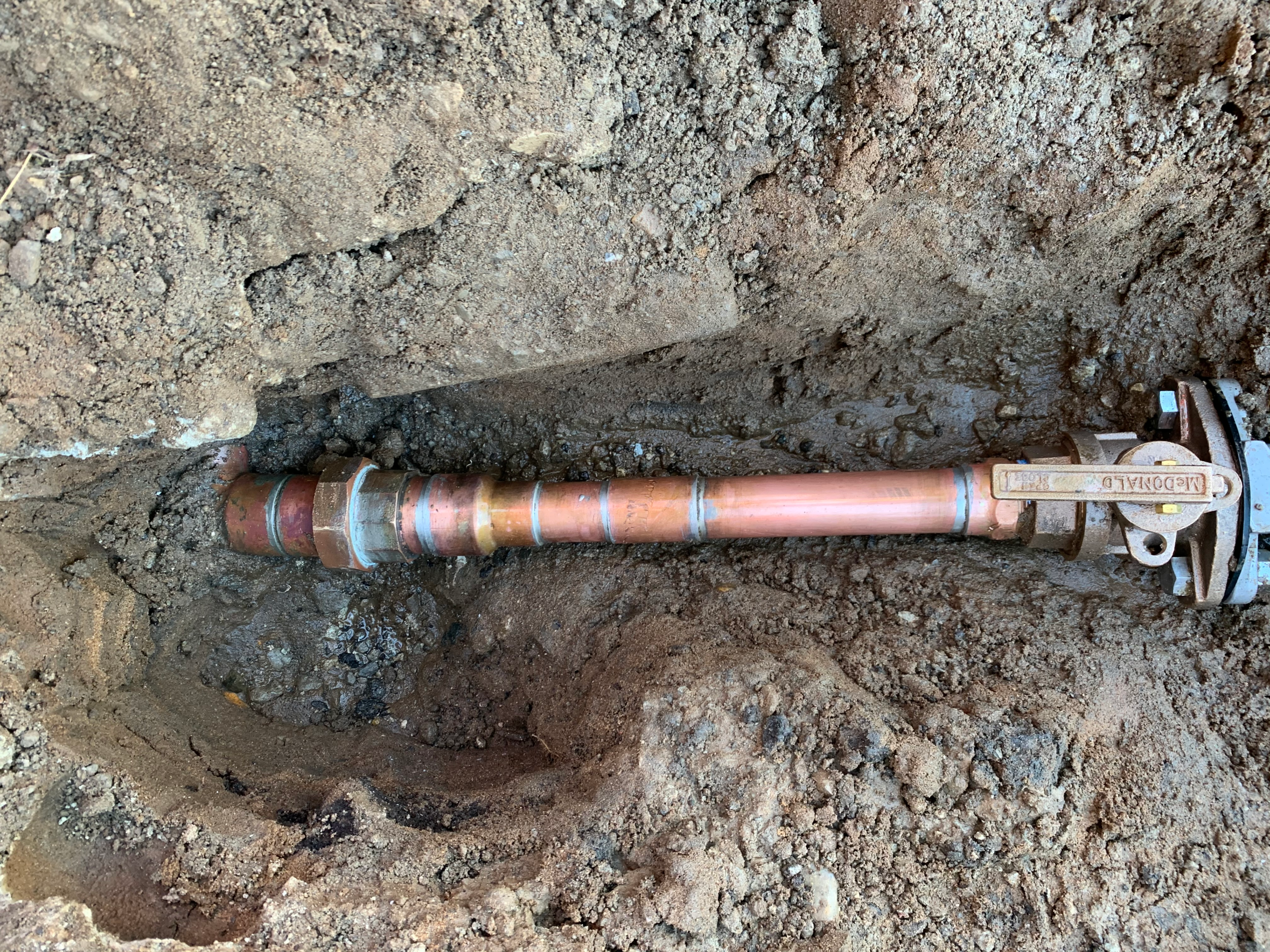 main-service-line-spot-repair A repair was made to a leaking copper main service line near the water meter.