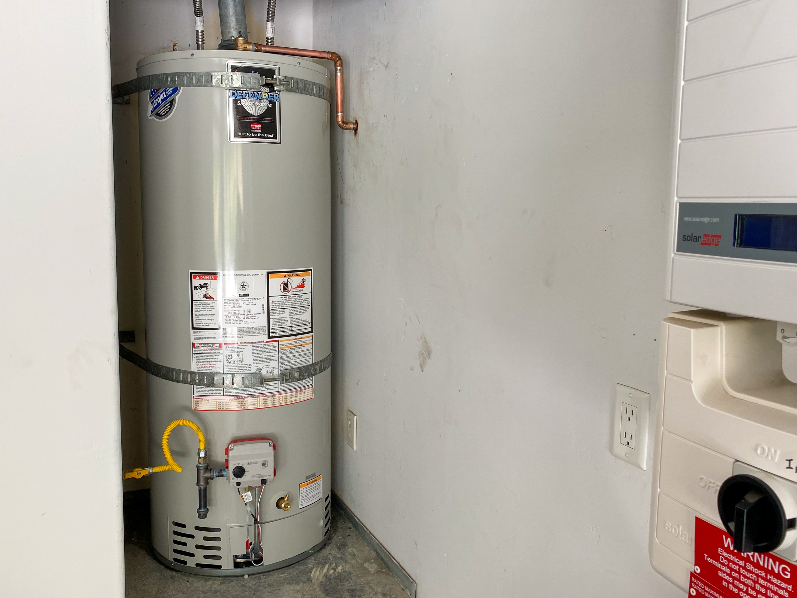 Professional water heater service is being carried out by an experienced Escondido plumber.