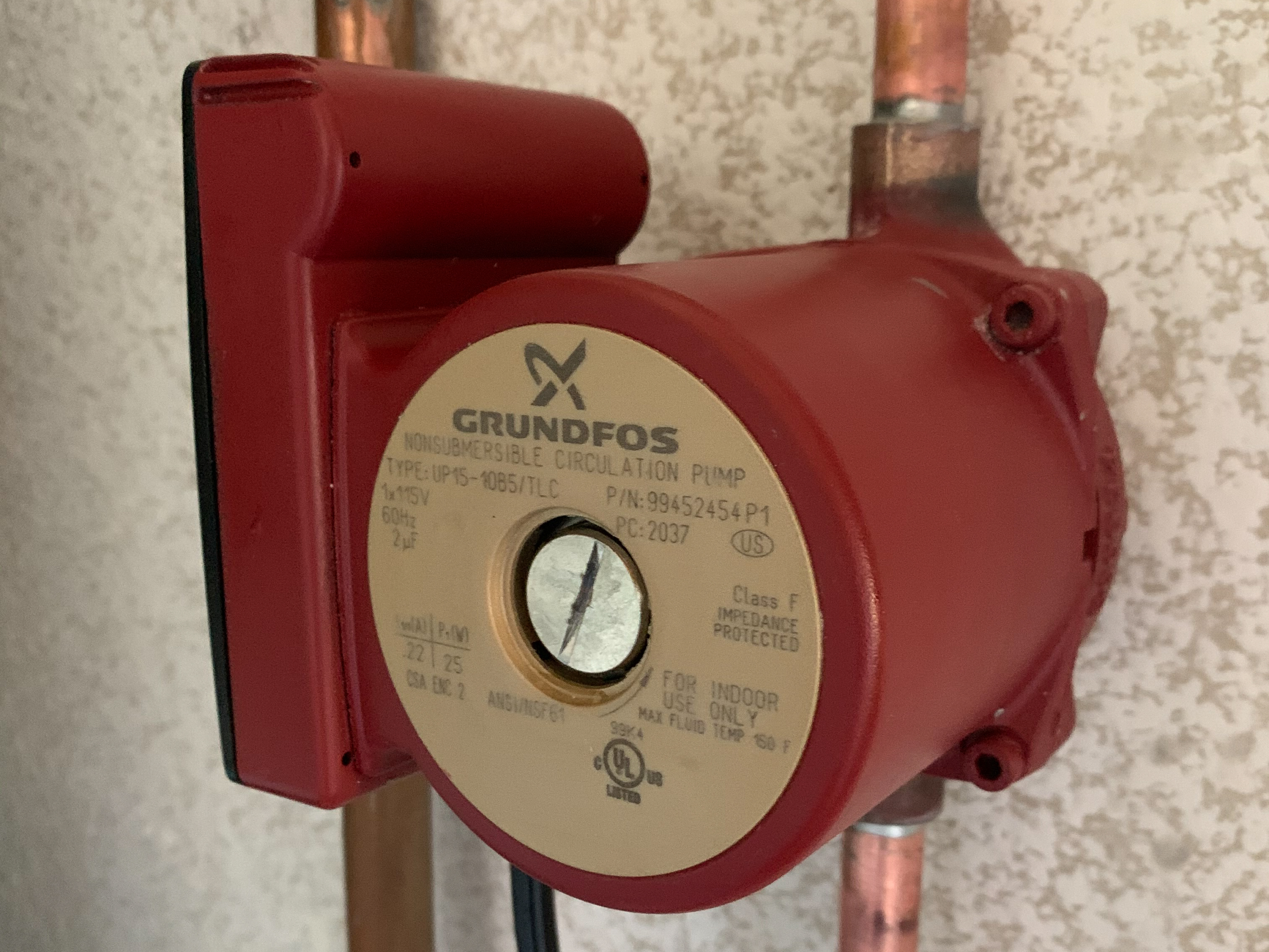hot-water-recirculating-pump-installation In order to deliver hot water to distant fixtures quickly. a Grundfos recirculating pump is installed with a residential gas water heater.