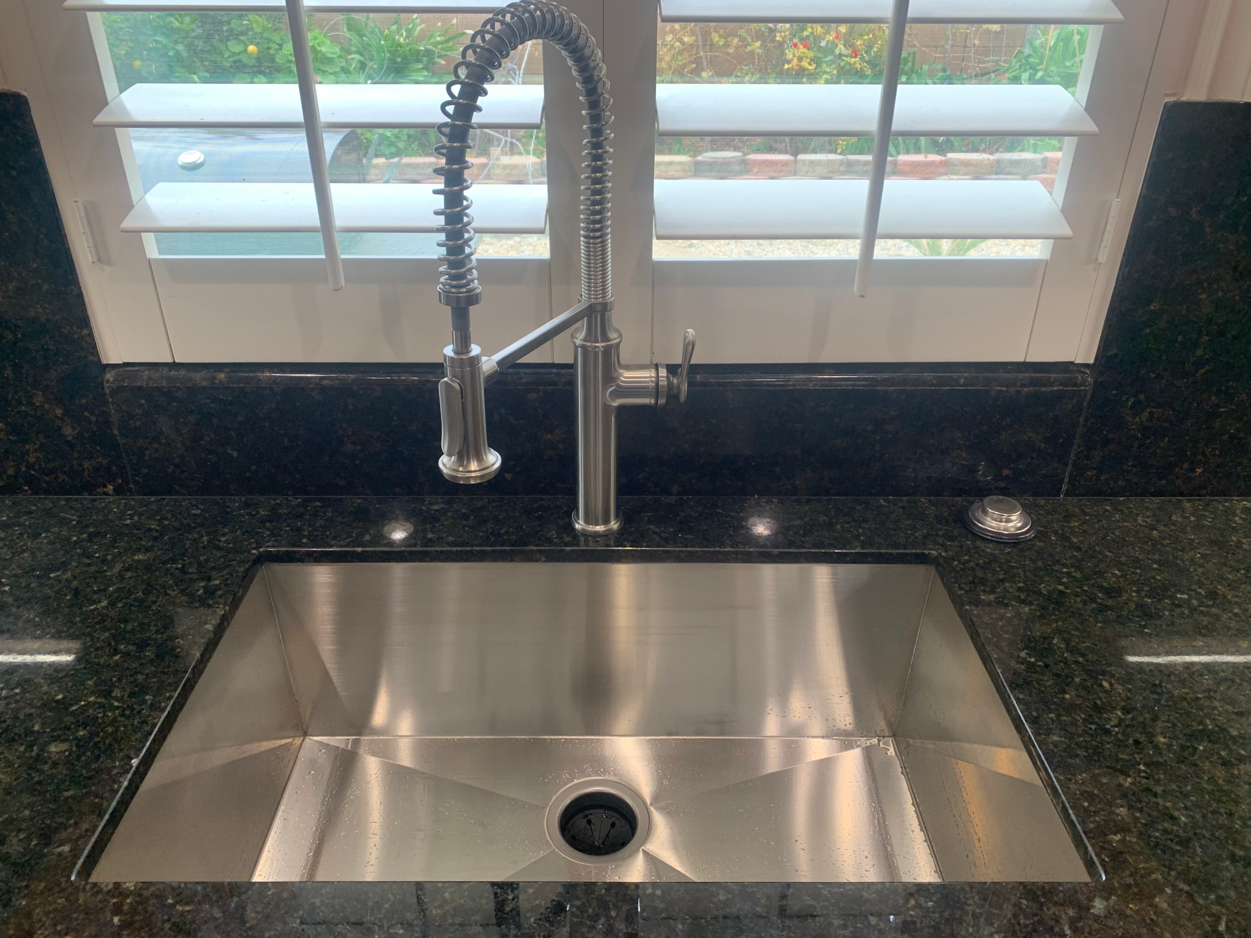 interior-faucet-kitchen A kitchen faucet with pull-out sprayer is an example of an interior faucet we service, repair and replace.