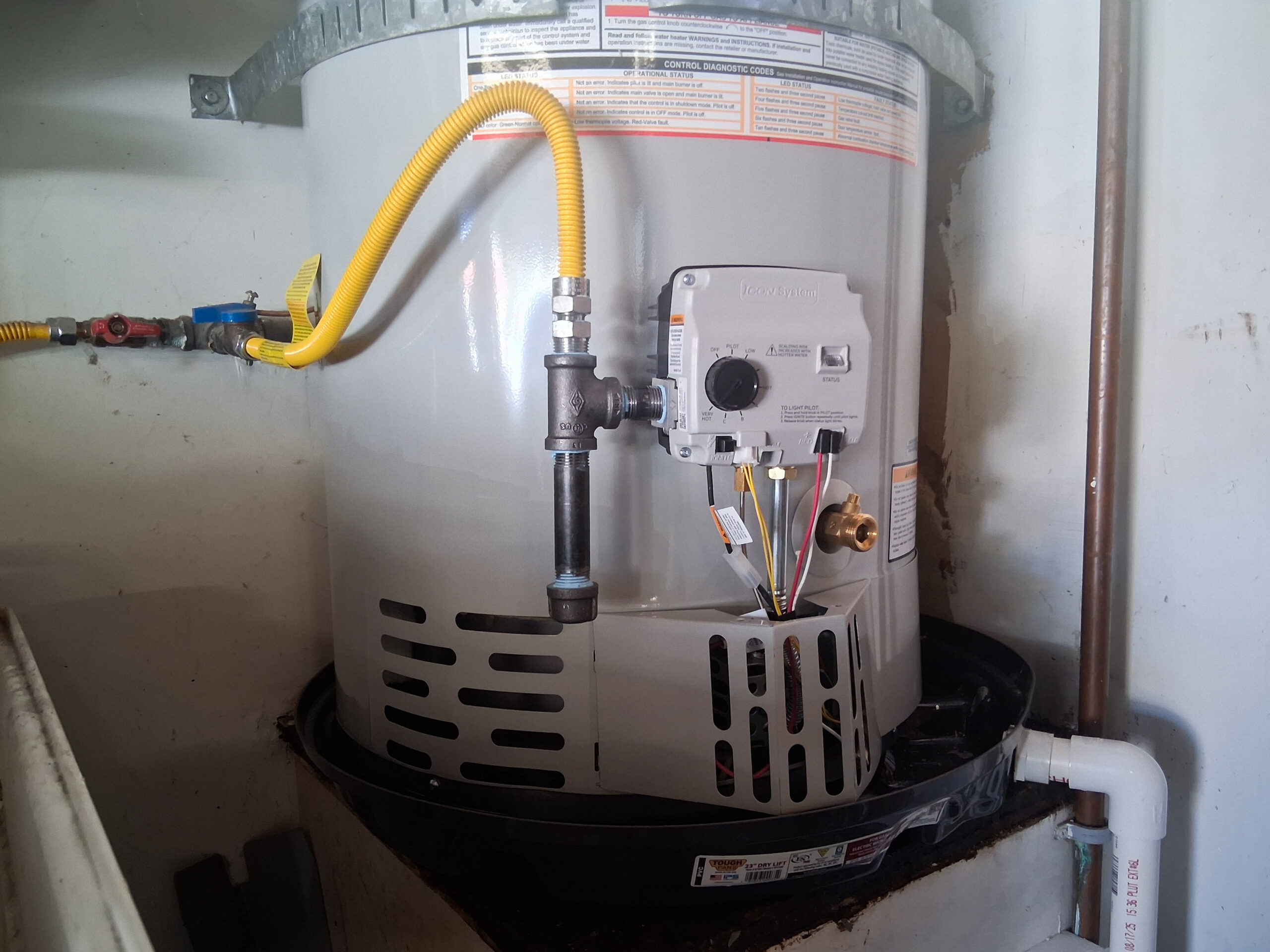 recent-water-heater-drain-pan-gas-supply A water heater replacement that inckudes a drain pan and gas supply upgrades.