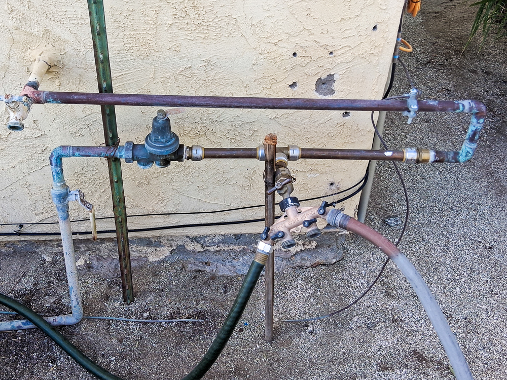 whole-home-water-filter-piping-mods Old, poorly-supported copper piping was removed and replaced with new, properly anchored copper pipe.